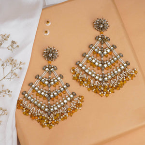 Traditional Kundan earrings in gold-tone, perfect for weddings and festive wear