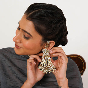 Traditional Kundan earrings in gold-tone, perfect for weddings and festive wear