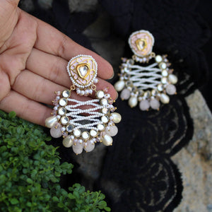 Traditional Kundan earrings in gold-tone, perfect for weddings and festive wear