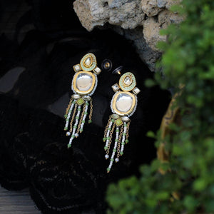 Traditional Kundan earrings in gold-tone, perfect for weddings and festive wear