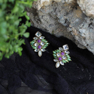 Traditional Kundan earrings in gold-tone, perfect for weddings and festive wear