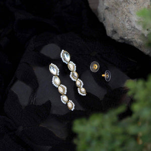 Traditional Kundan earrings in gold-tone, perfect for weddings and festive wear