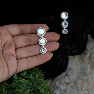 Traditional Kundan earrings in gold-tone, perfect for weddings and festive wear