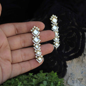 Traditional Kundan earrings in gold-tone, perfect for weddings and festive wear