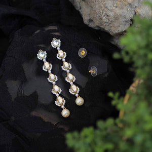 Traditional Kundan earrings in gold-tone, perfect for weddings and festive wear