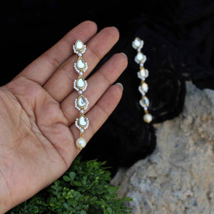 Traditional Kundan earrings in gold-tone, perfect for weddings and festive wear