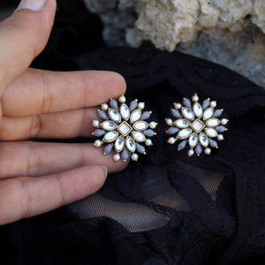 Traditional Kundan earrings in gold-tone, perfect for weddings and festive wear