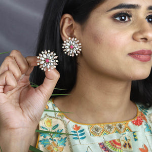Traditional Kundan earrings in gold-tone, perfect for weddings and festive wear
