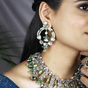 Traditional Kundan earrings in gold-tone, perfect for weddings and festive wear
