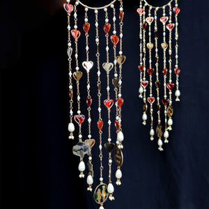 Romantic pearl Kaleere with red resin hearts charms, gold detailing and playful personalised charms  from the Darpan kalire collection by BeAbhika