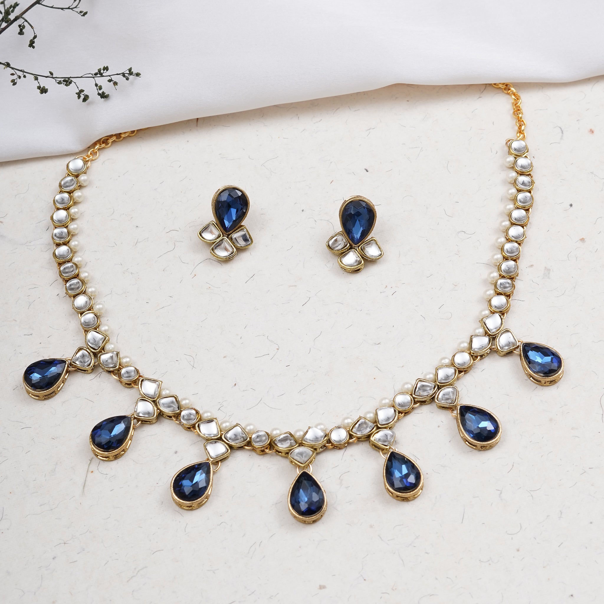 Kundan choker set in gold-tone with matching earrings and long bridal necklace, perfect for wedding functions , festive and bridal wear Blue Necklace