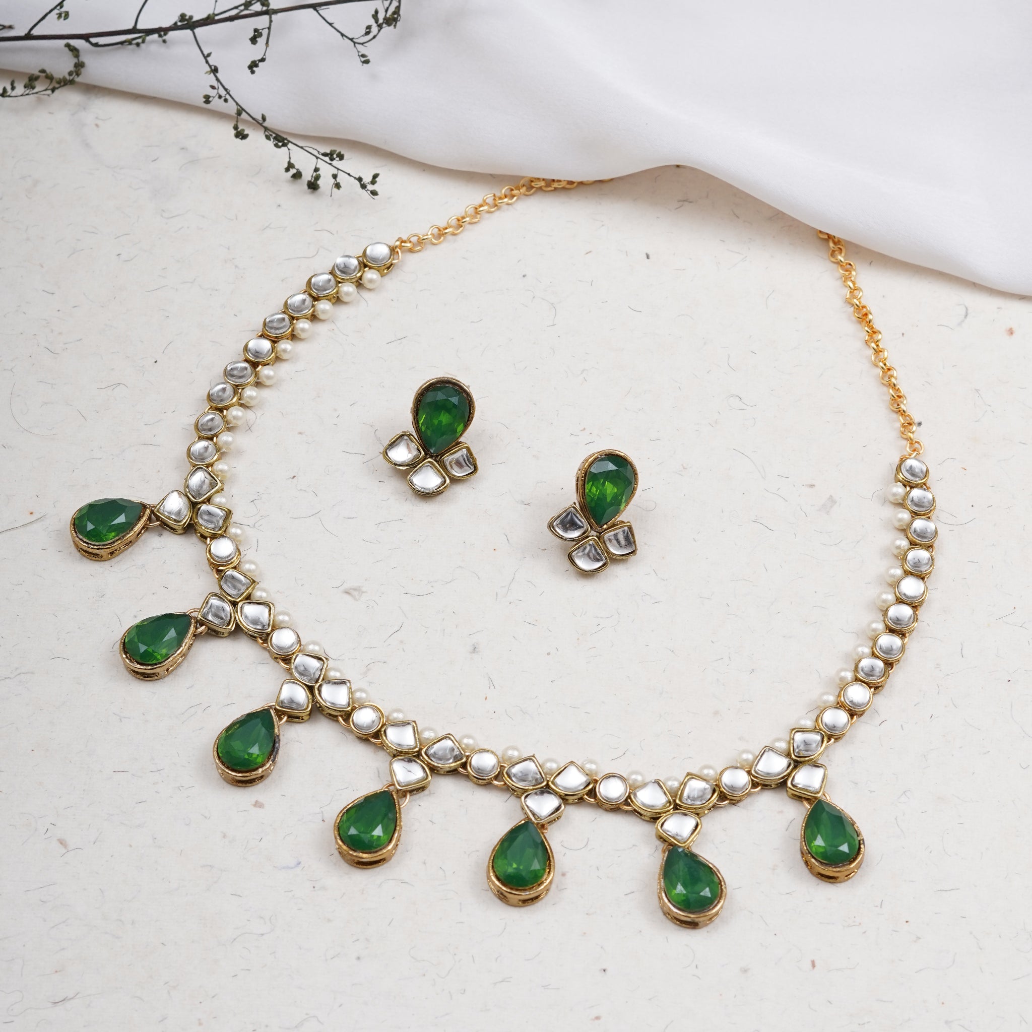 Kundan choker set in gold-tone with matching earrings and long bridal necklace, perfect for wedding functions , festive and bridal wear Green Necklace