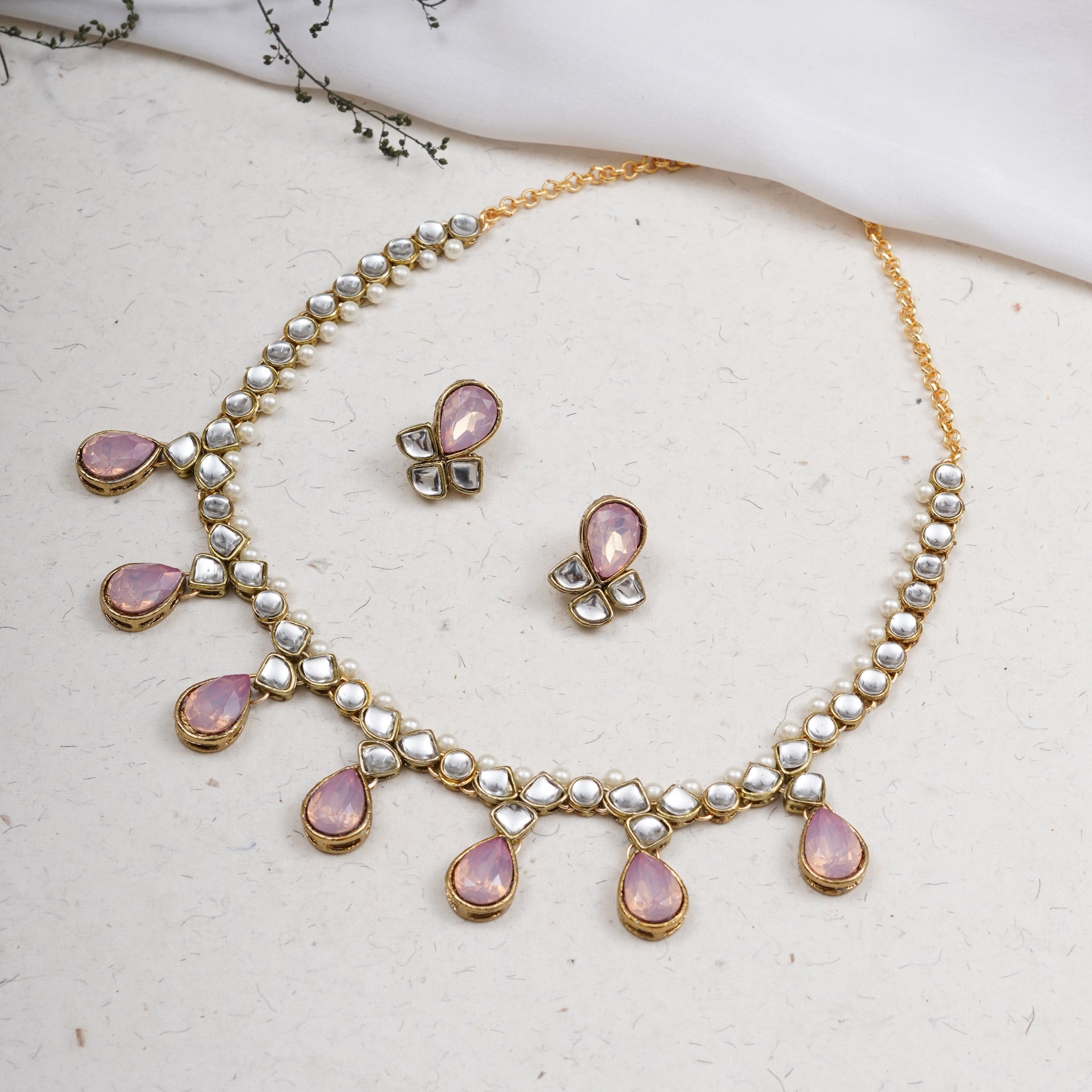 Kundan choker set in gold-tone with matching earrings and long bridal necklace, perfect for wedding functions , festive and bridal wear Pink Necklace