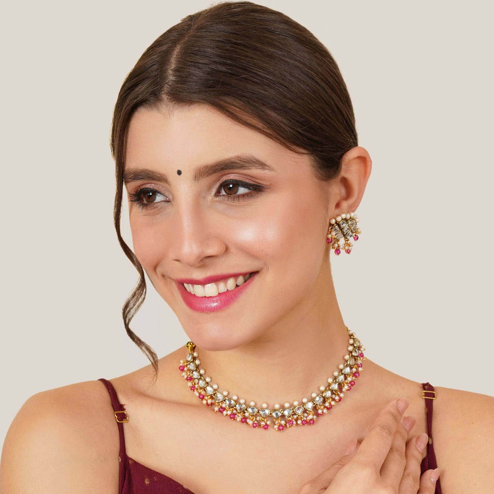 Kundan choker set in gold-tone with matching earrings and long bridal necklace, perfect for wedding functions , festive and bridal wear
