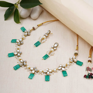 Kundan choker set in gold-tone with matching earrings and long bridal necklace, perfect for wedding functions , festive and bridal wear