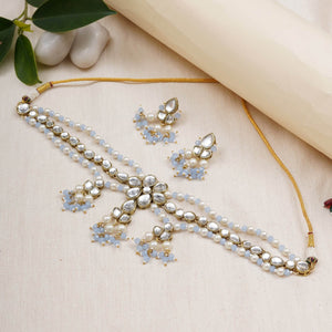 Kundan choker set in gold-tone with matching earrings and long bridal necklace, perfect for wedding functions , festive and bridal wear