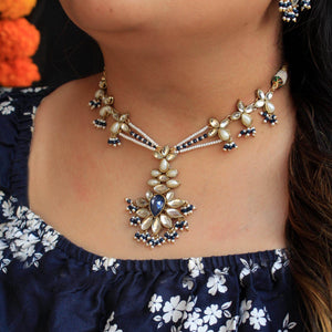 Kundan choker set in gold-tone with matching earrings and long bridal necklace, perfect for wedding functions , festive and bridal wear