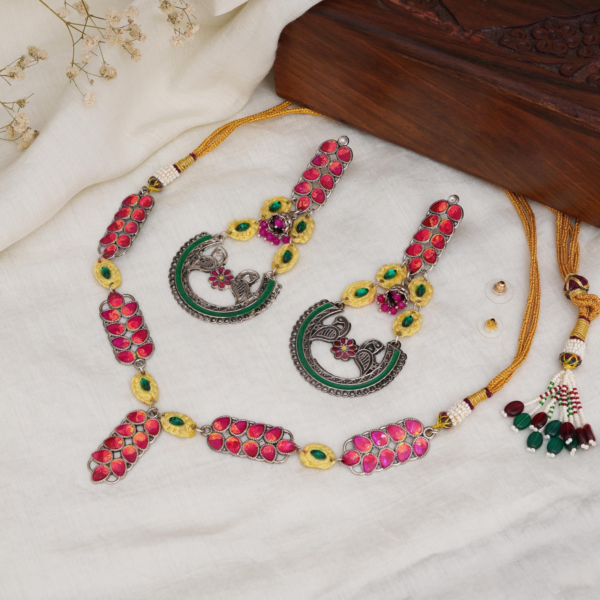 Bold Red and Green Meenakari Necklace with Peacock Motif Earrings