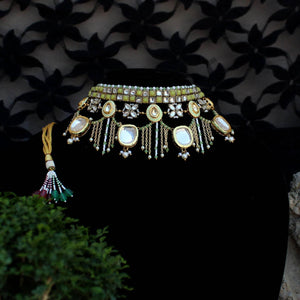 Kundan choker set in gold-tone with matching earrings and long bridal necklace, perfect for wedding functions , festive and bridal wear