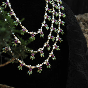 Kundan choker set in gold-tone with matching earrings and long bridal necklace, perfect for wedding functions , festive and bridal wear