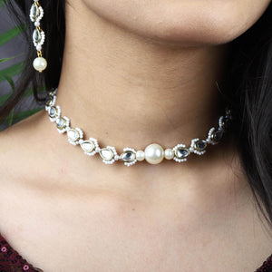 Kundan choker set in gold-tone with matching earrings and long bridal necklace, perfect for wedding functions , festive and bridal wear