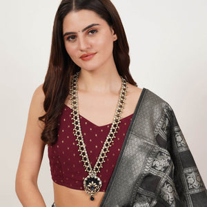 Kundan choker set in gold-tone with matching earrings and long bridal necklace, perfect for wedding functions , festive and bridal wear