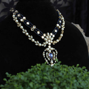 Kundan choker set in gold-tone with matching earrings and long bridal necklace, perfect for wedding functions , festive and bridal wear