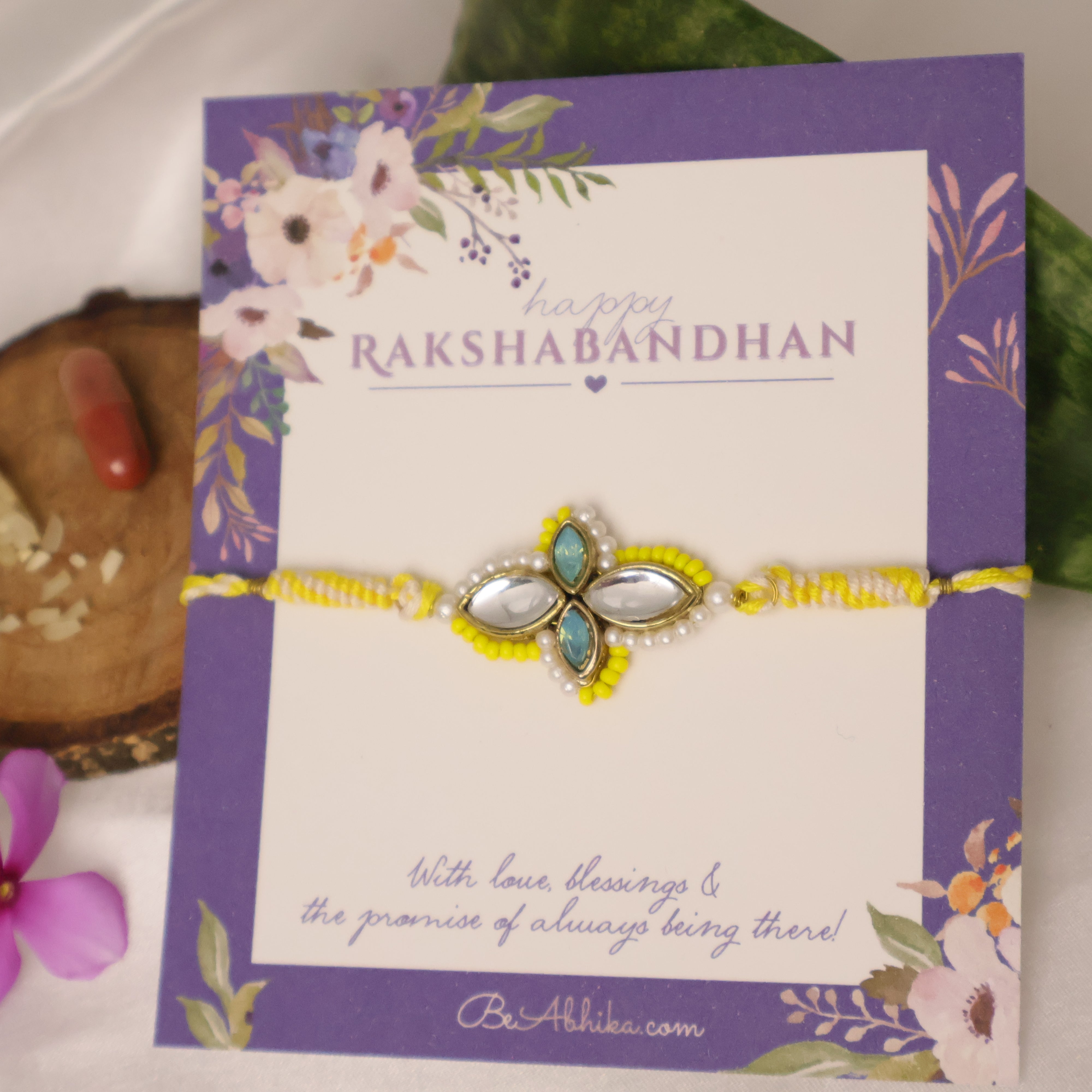 Yellow Kundan Floral Pearl Rakhi