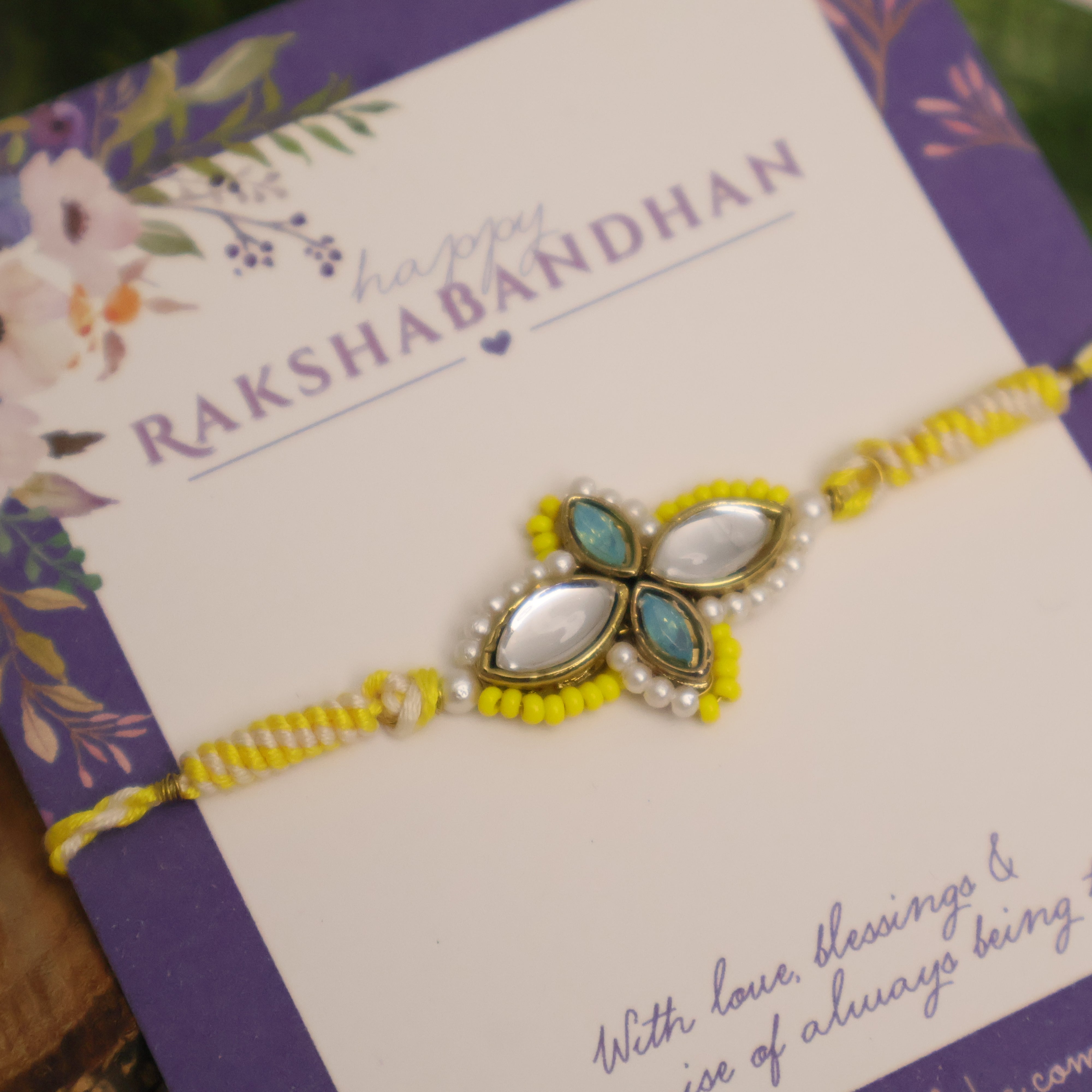 Yellow Kundan Floral Pearl Rakhi