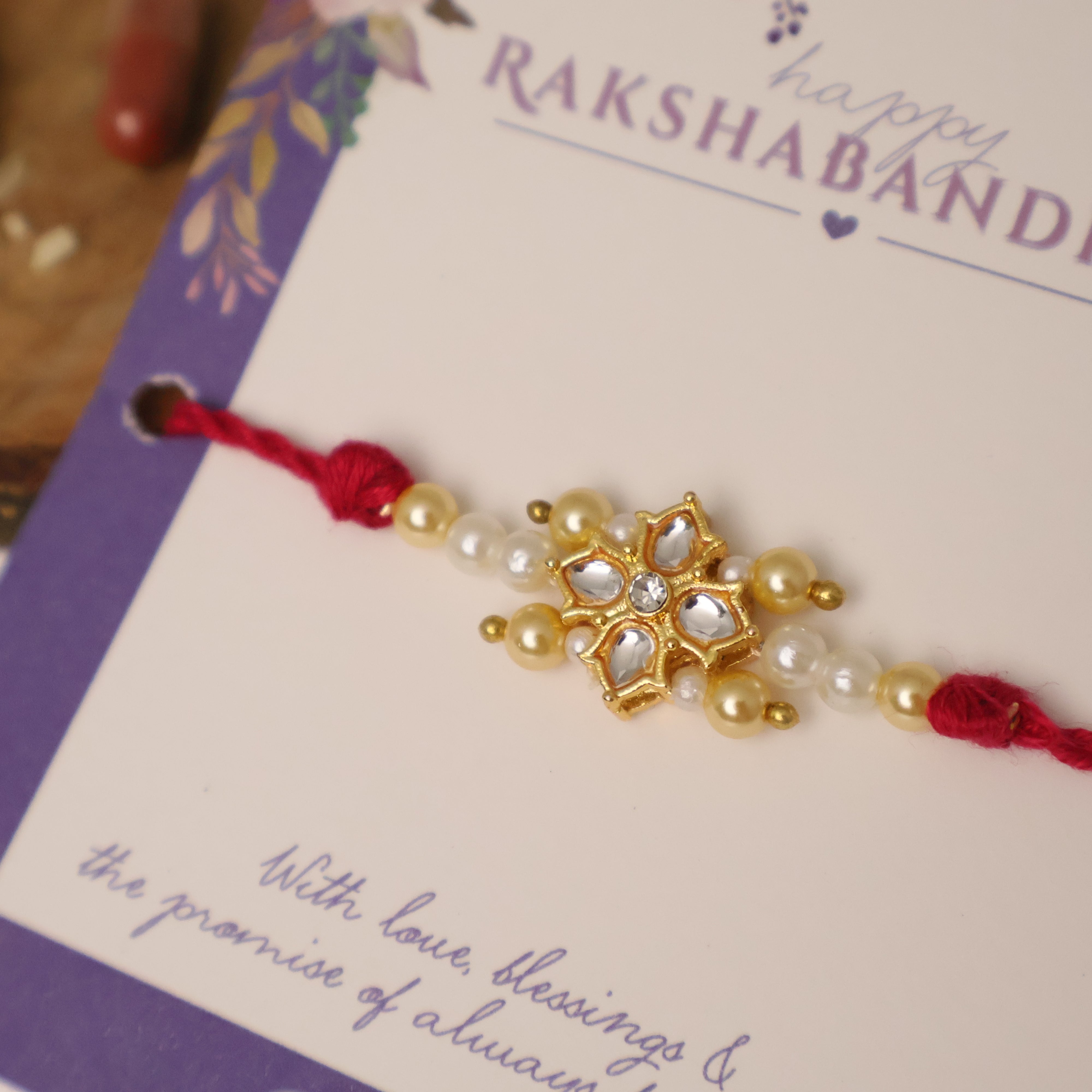 Kundan Floral Pearl Red Rakhi