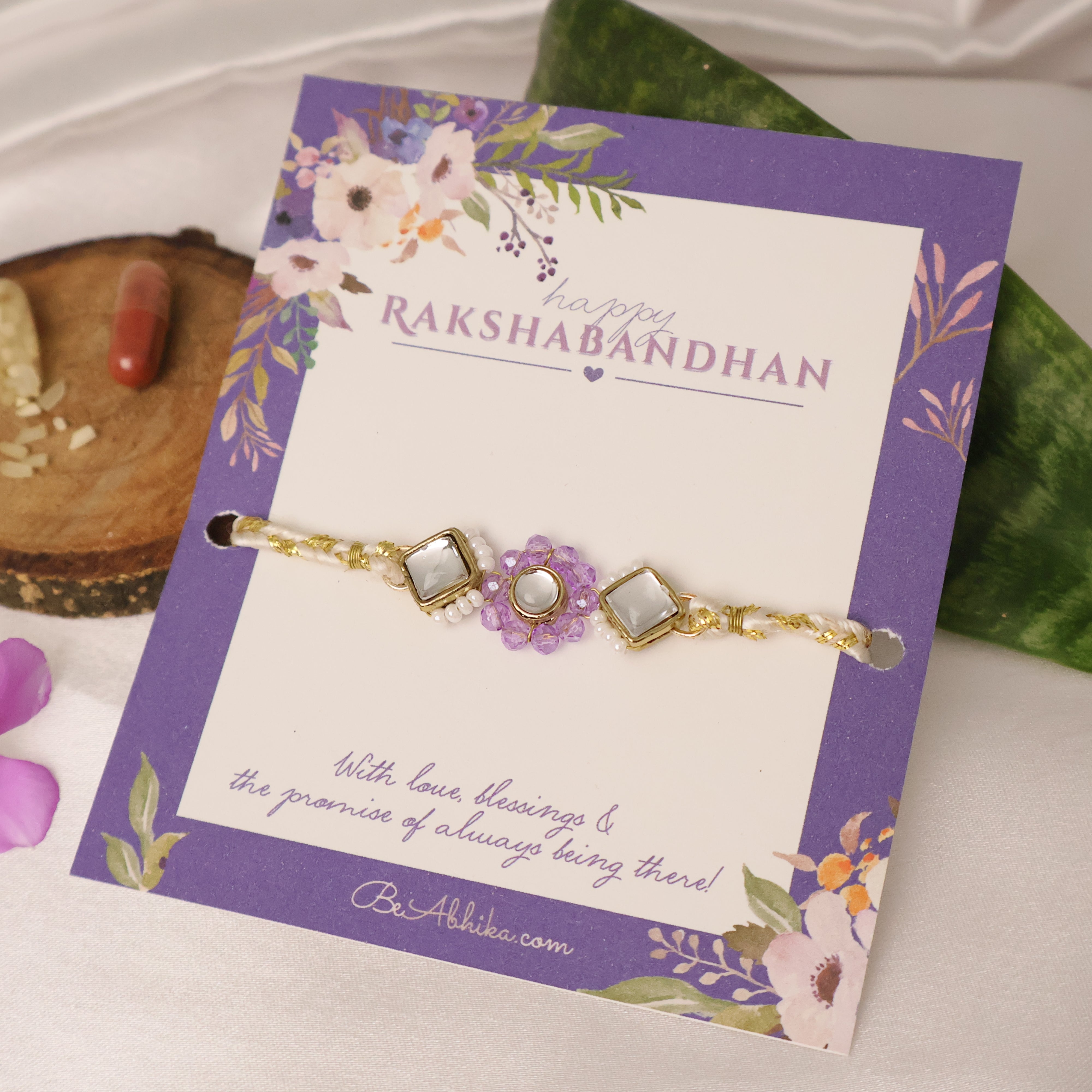 Purple Floral Pearl Stone Rakhi