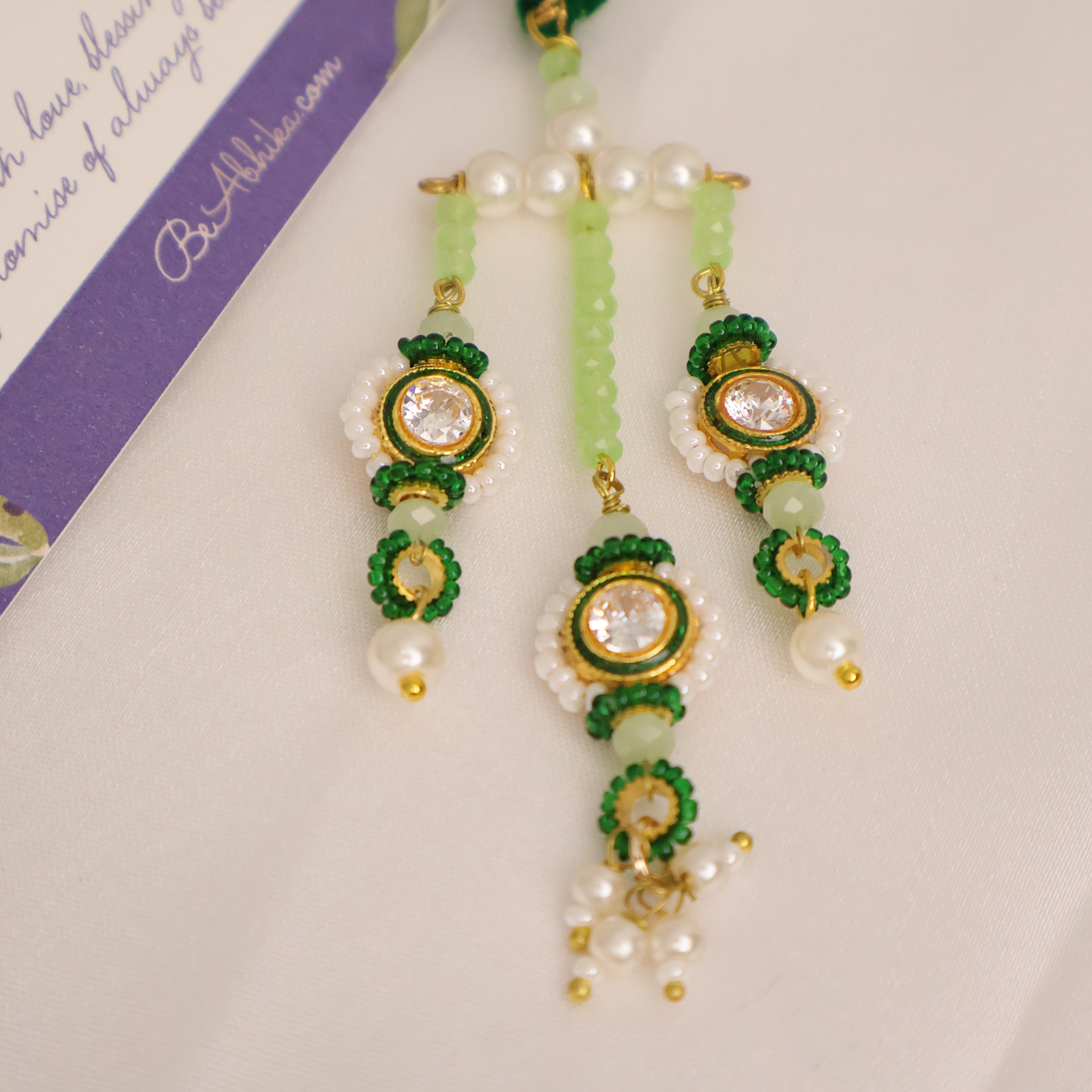 Emerald Kundan Pearl Tassel Designer Lumba
