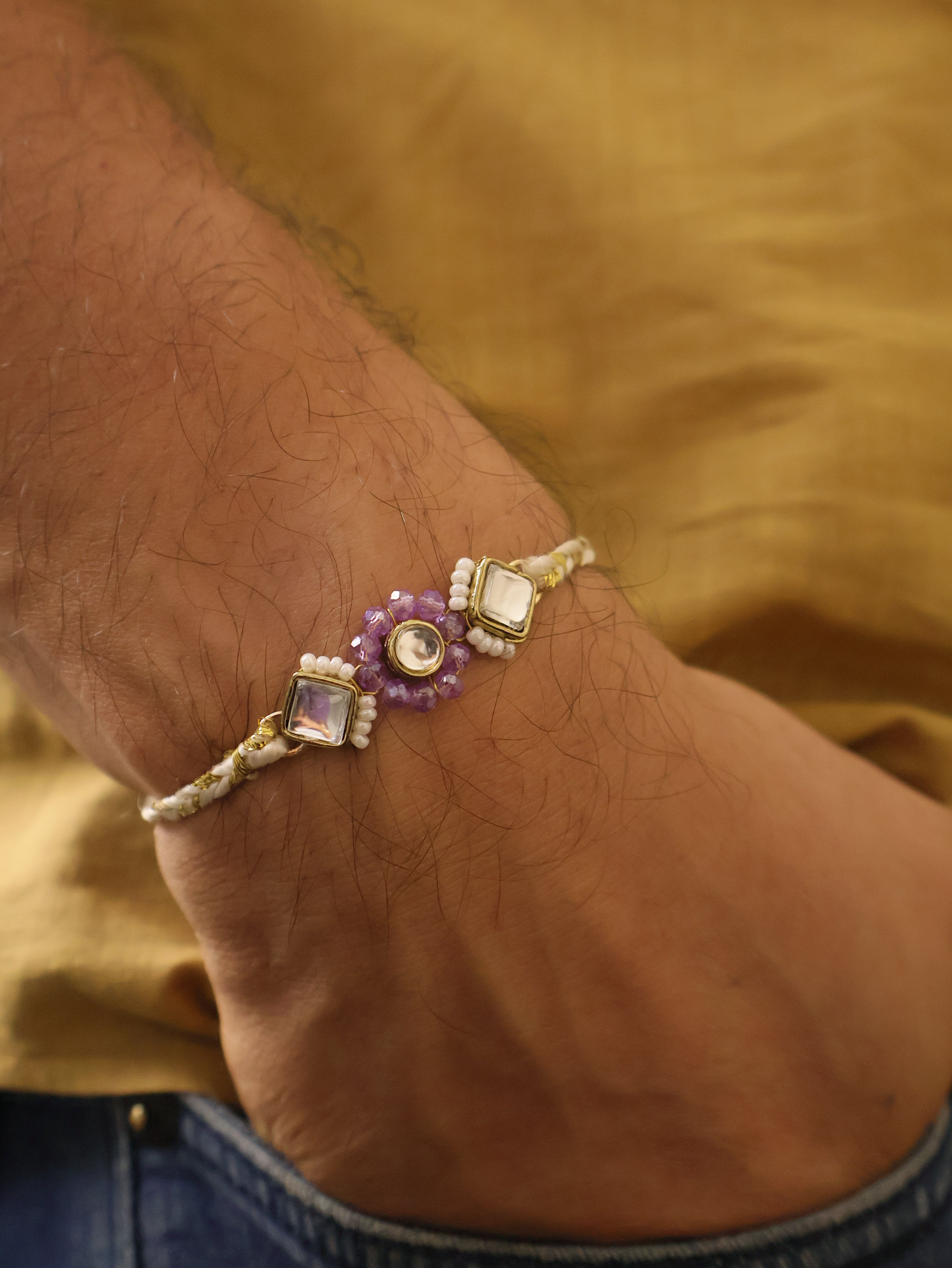 Purple Floral Pearl Stone Rakhi