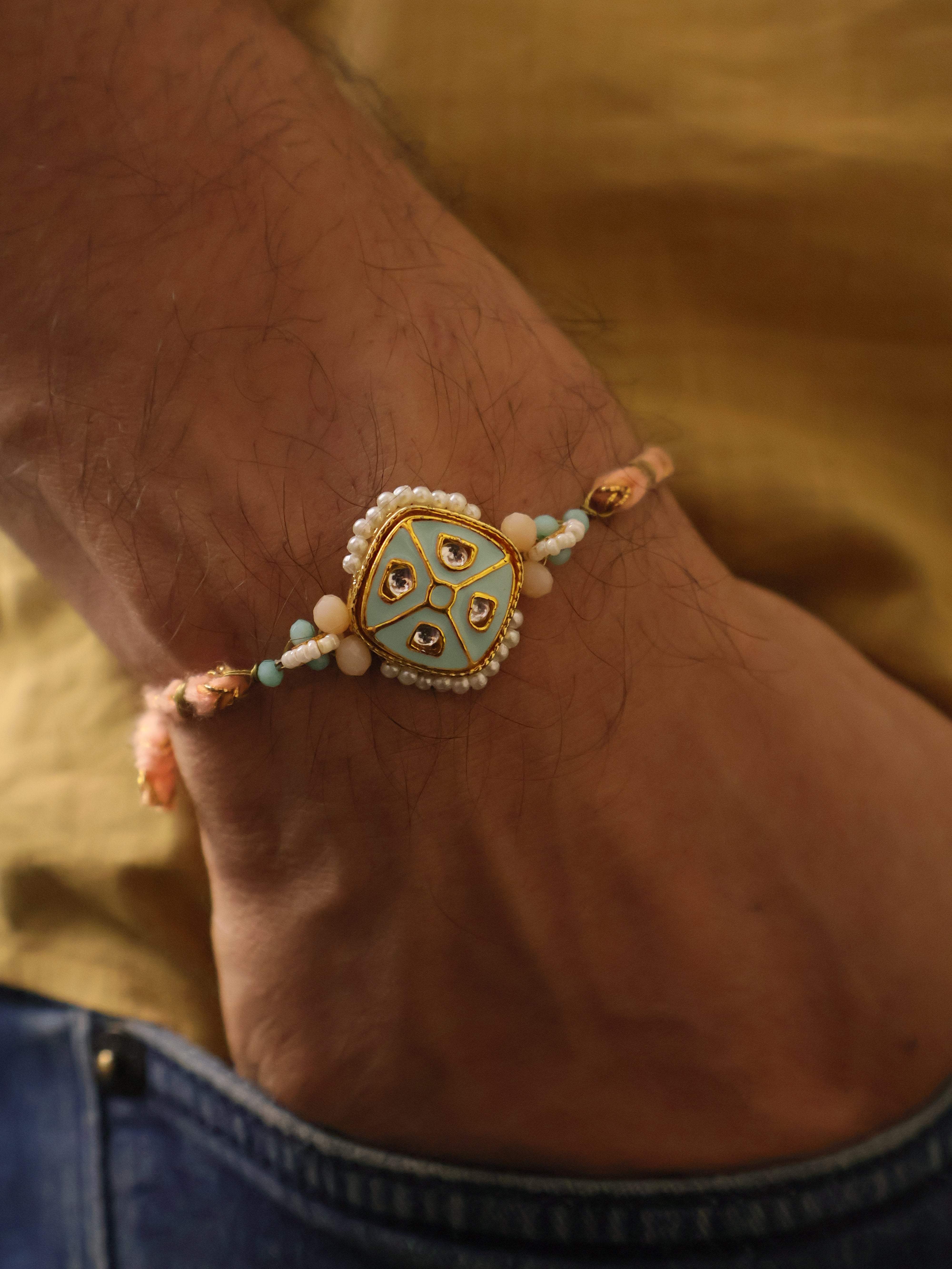 Pastel Kundan Pearl Charm Rakhi