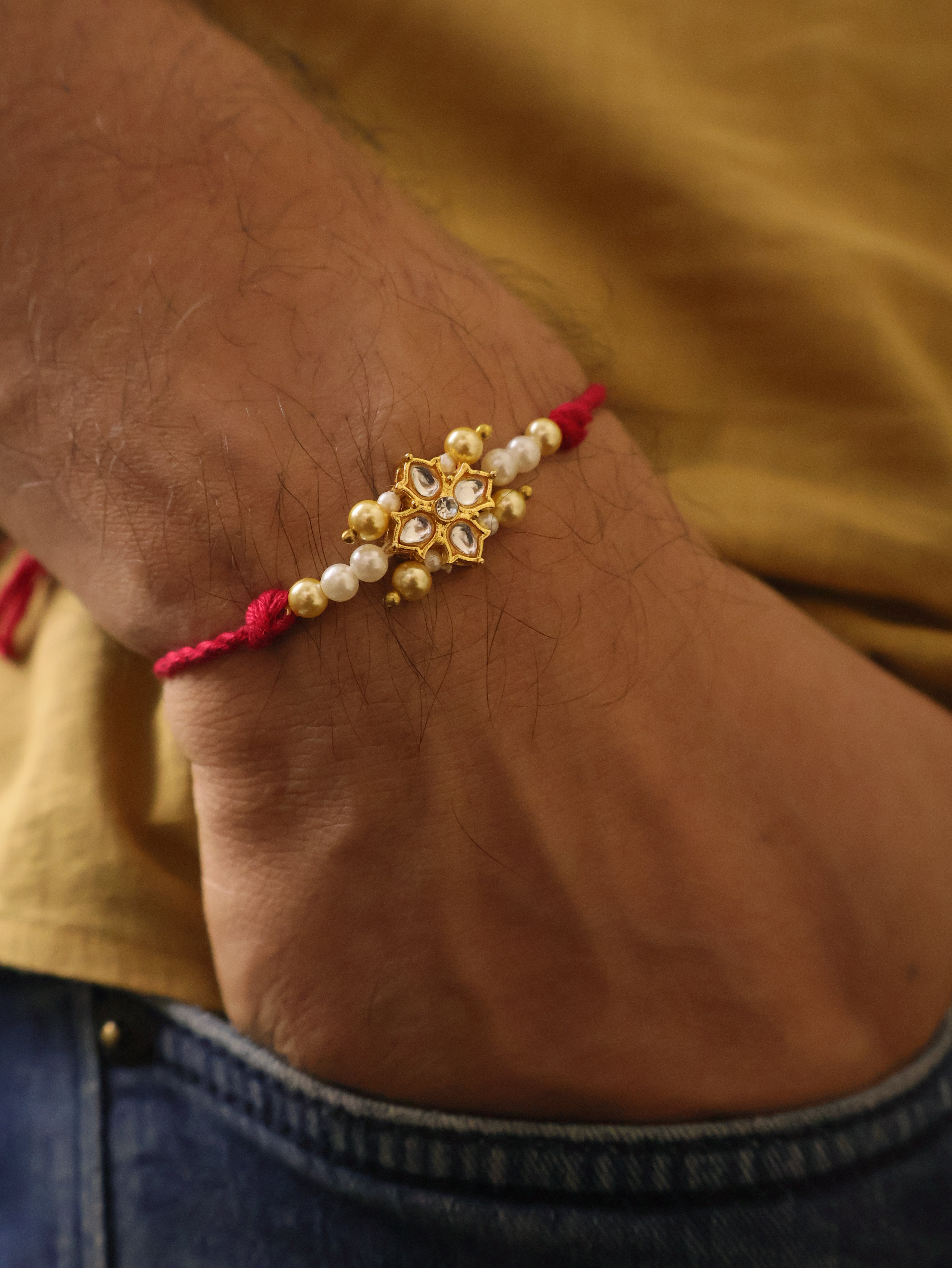 Kundan Floral Pearl Red Rakhi