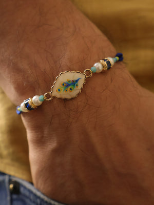 Blue Peacock Pearl Charm Rakhi