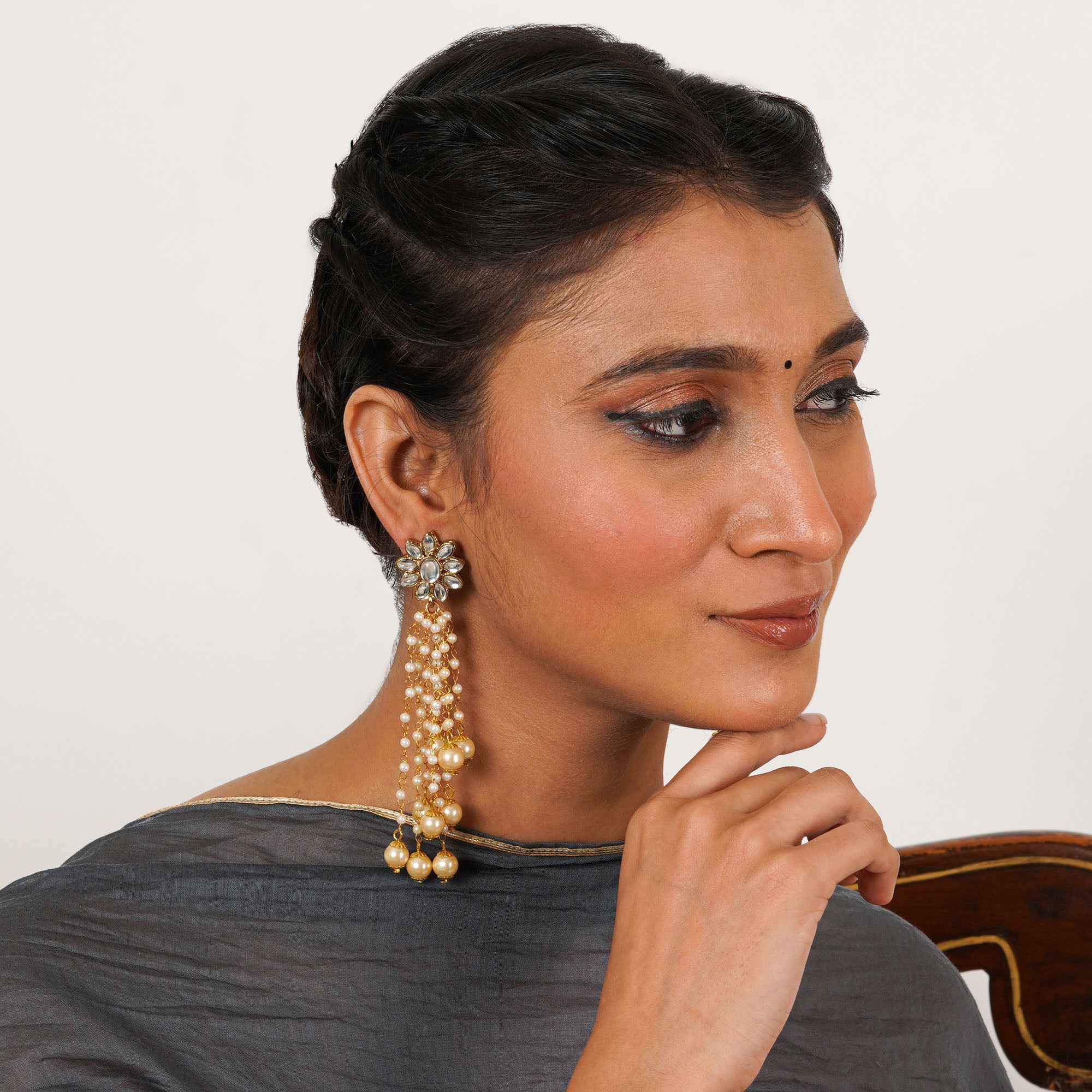 Traditional Kundan earrings in gold-tone, perfect for weddings and festive wear