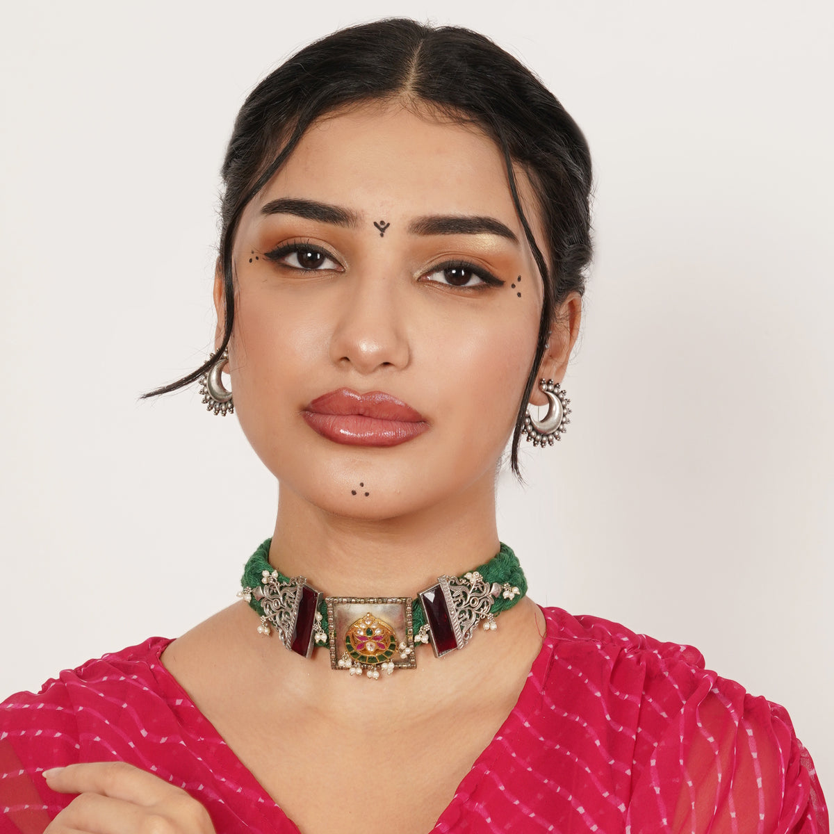 A beautifully textured choker that brings together a braided form with delicate floral accents. Intricate yet easy to wear, the design has a playful elegance that makes it stand out without feeling overpowering. A versatile piece made to add character to both classic and contemporary looks. 