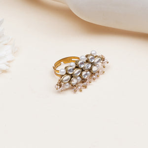 Floral Kundan ring with pearl details, featuring marquise-shaped glass stones, white faux pearls and gold-tone mixed alloy.