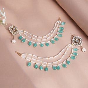 Sea-green beaded ear cuff with floral Kundan and hairchain, featuring glass stones, white faux pearls and gold-tone alloy.