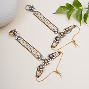 Pearl-Strand Hathphool with Floral Kundan, featuring round glass stones, white faux pearls and gold-tone mixed alloy.