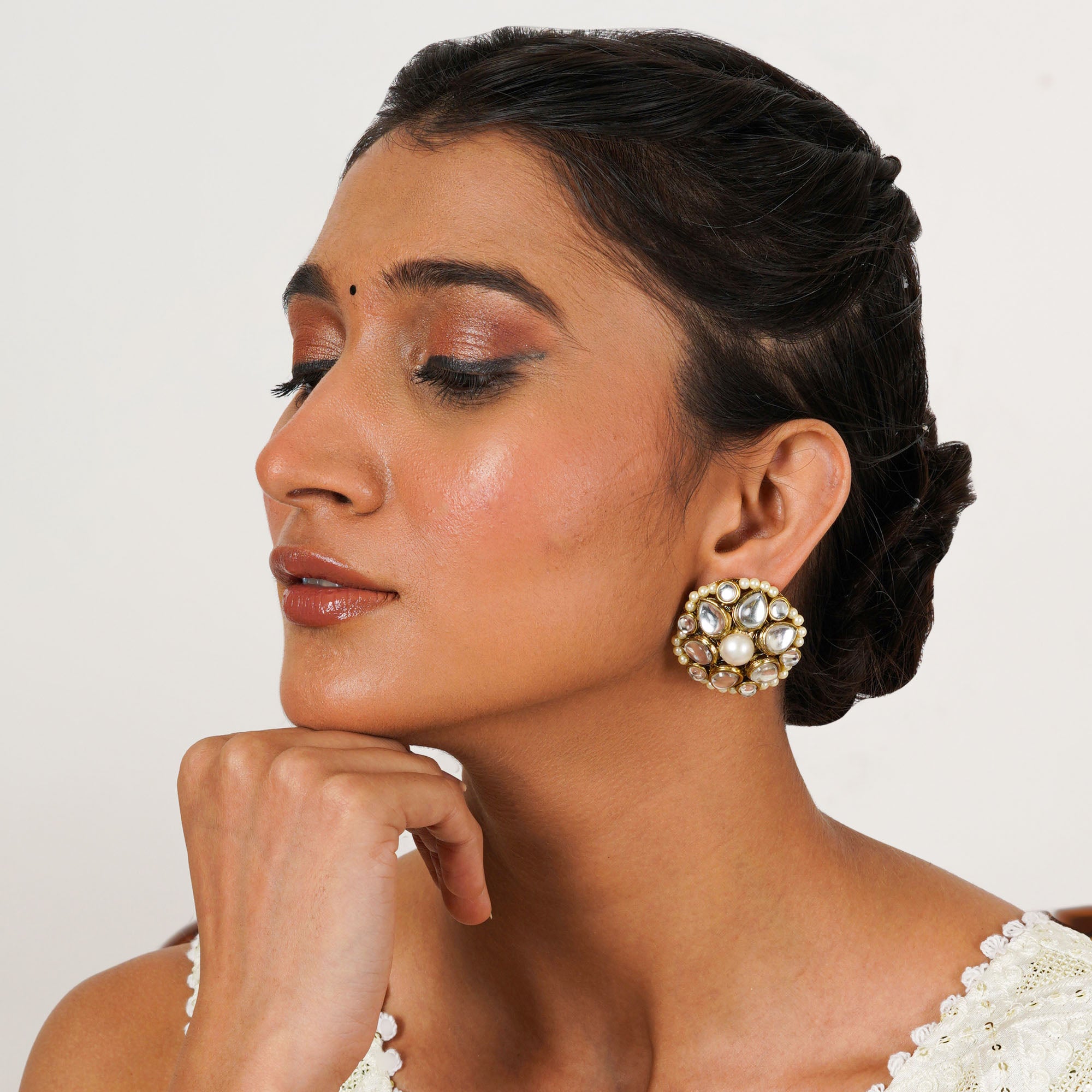 Traditional Kundan earrings in gold-tone, perfect for weddings and festive wear