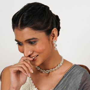 Kundan choker set in gold-tone with matching earrings and long bridal necklace, perfect for wedding functions , festive and bridal wear