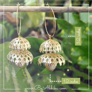 Traditional Kundan earrings in gold-tone, perfect for weddings and festive wear