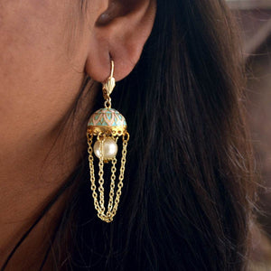 Traditional Kundan earrings in gold-tone, perfect for weddings and festive wear