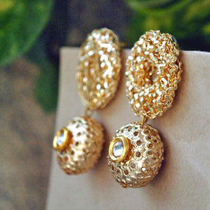Traditional Kundan earrings in gold-tone, perfect for weddings and festive wear