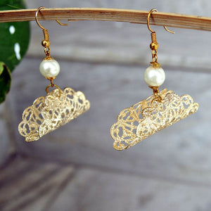 Traditional Kundan earrings in gold-tone, perfect for weddings and festive wear