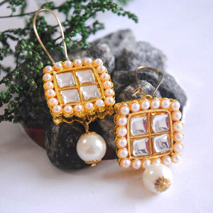 Traditional Kundan earrings in gold-tone, perfect for weddings and festive wear