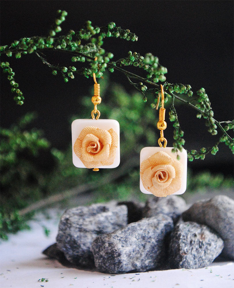Traditional Kundan earrings in gold-tone, perfect for weddings and festive wear