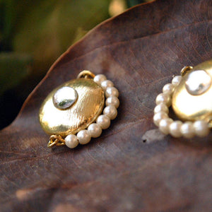 Traditional Kundan earrings in gold-tone, perfect for weddings and festive wear